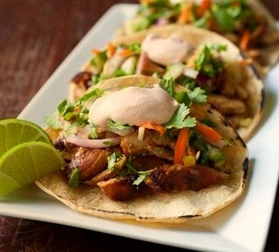 Korean BBQ Chicken Tacos with Coleslaw and Sriracha Sour Cream